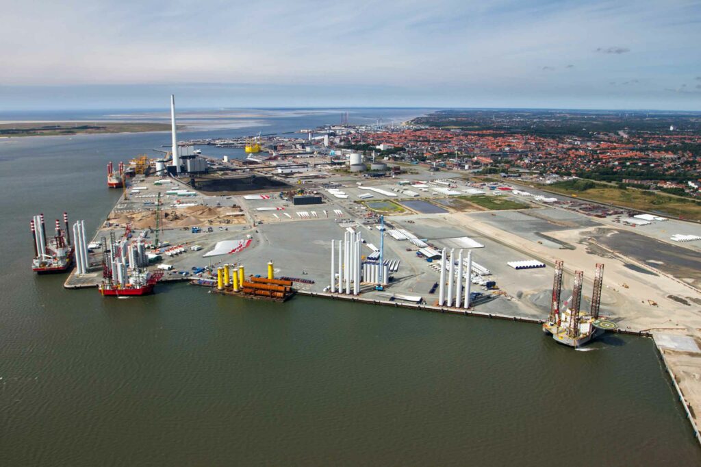 Shipyard with jack-up rigs and offshore wind turbines